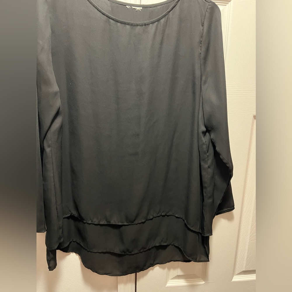 Women’s dress blouse with layered front.